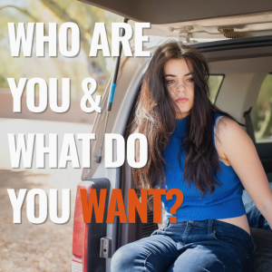 Young woman in blue tank top and blue jeans sits in the back of her SUV contemplating who she is